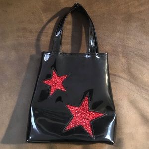 Small black vinyl purse w/ 2 sparkly red stars